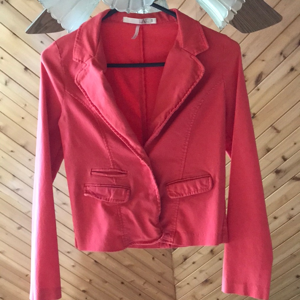 Blazer orangish in color